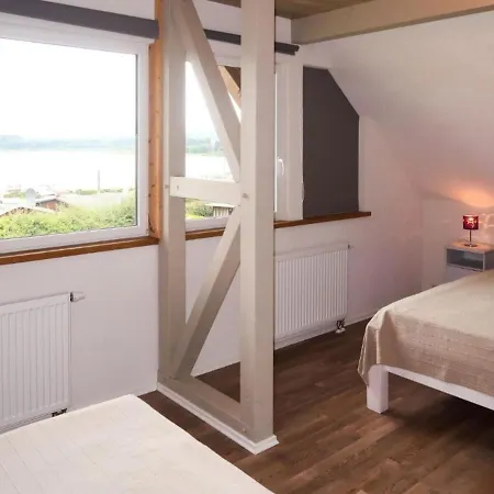 Prázdninový dům Ferienhaus Am See West100 *